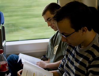 reading bookkeeping course on train
